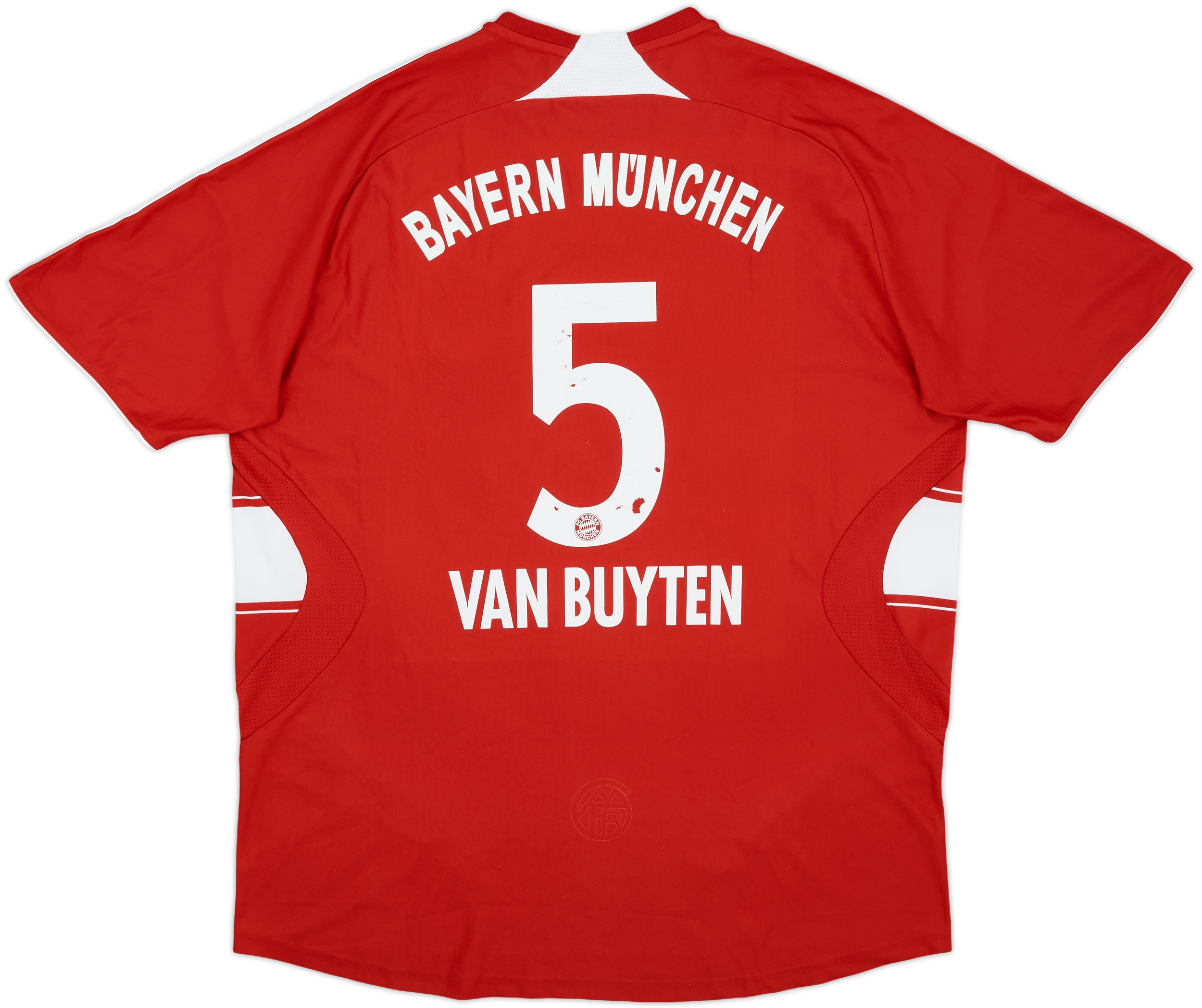 Bayern's Mark van Bommel (back) consoles teammate Arjen