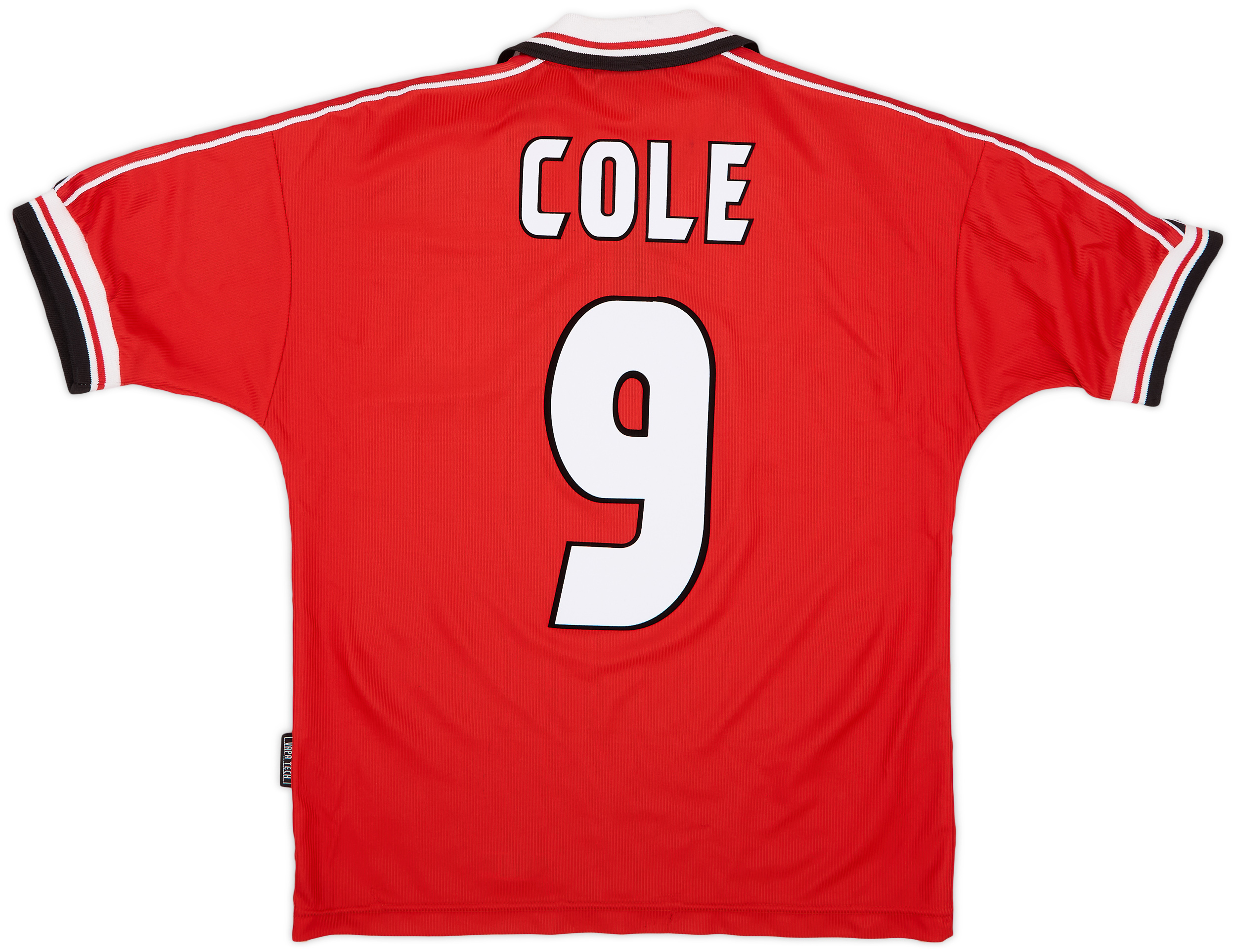 Liverpool FC new signing Joe Cole holds up a Liverpool shirt